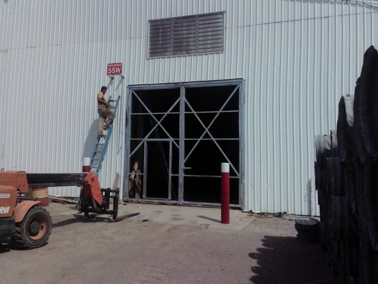 Potato storage truck door with man door - custom fabricated