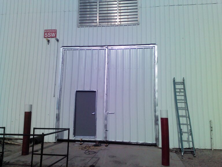 Potato storage truck door with man door - custom fabricated